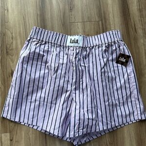 Dressed in LALA boxer shorts